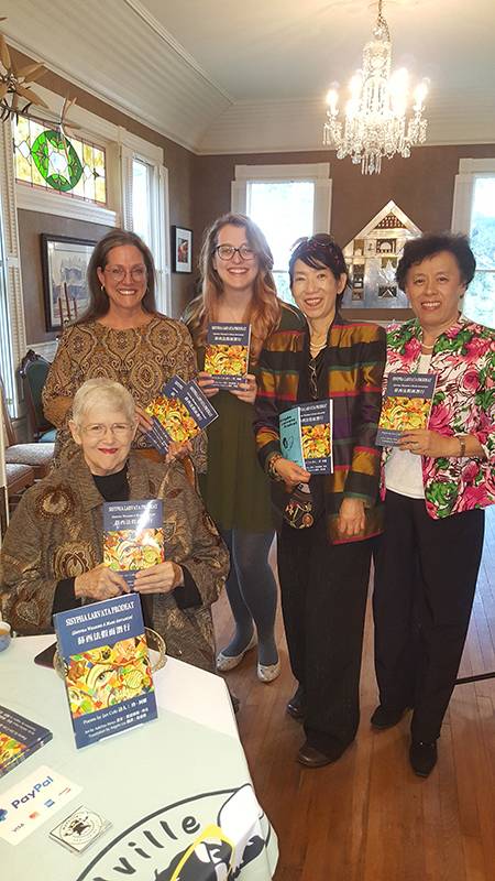 Poet, Jan Cole, seated, Kim Davis, Jacqui Davis, Lorrie Lo, and Joy Pan at the book launch party for Sisypha Larvata Prodeat