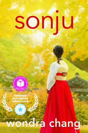 Sonju, by Wondra Chang, shows a Korean woman in traditional dress with a background of yellow ginko trees. A medallion is on the cover to indicate that Sonju has been chosen as the Pulpwood Queens featured selection. Also present is the coveted Kirkus Star