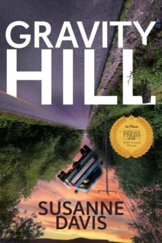 Gravity Hill by Susanne Davis shows a world upside down with a pickup truck turning over in a sunset sky. There is an award emblem that says 1st Place Connecticut Press Club Award 2002