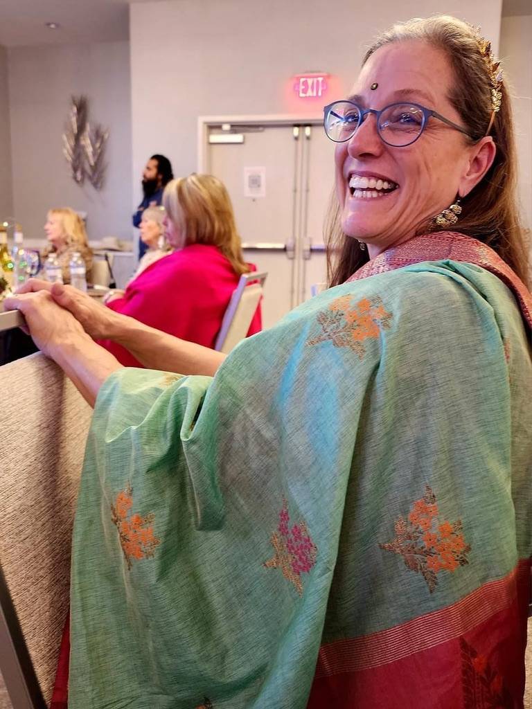 Madville Founder Kim Davis wears a sari during the Author Meet and Greet and Book Launch for Anju Gattani's "Dynasties" event.