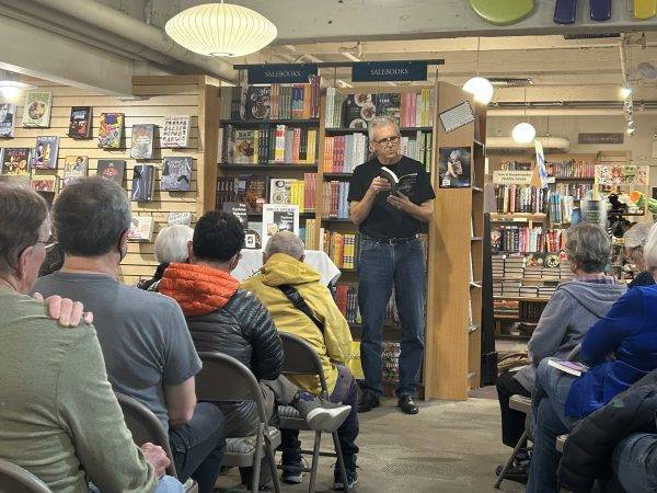 Bruce Overby reads at the launch party for his novel, The Cyclone Release.