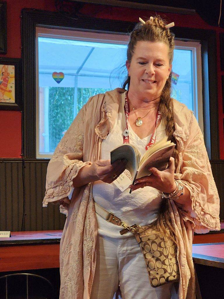 Former Texas Poet laureate Karla K. Morton reads from her collection, Turbulence and Fluids, at the Offsite Reading at The Chieftain Irish Pub: Madville Publishing, Iris Press, and Stephen F. Austin State University Press. Photo by Lee Zacharias.
