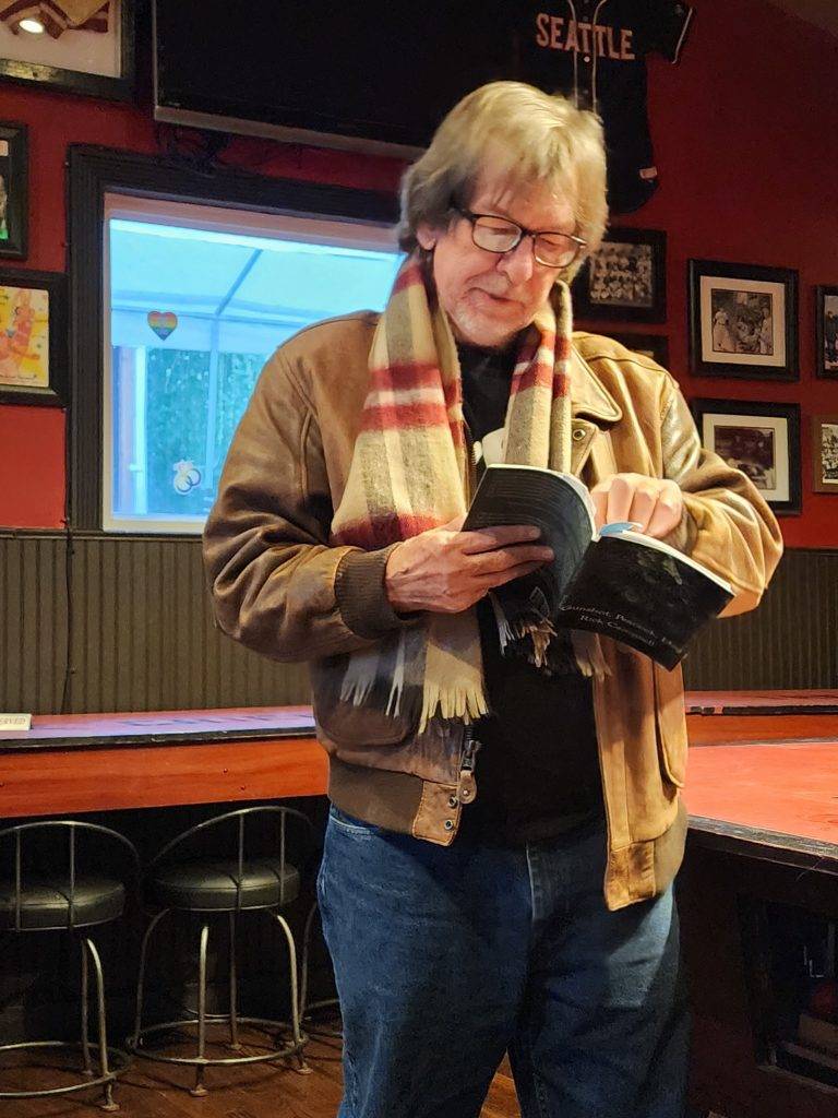 Poet Rick Campbell reads at the Offsite Reading at The Chieftain Irish Pub: Madville Publishing, Iris Press, and Stephen F. Austin State University Press. Photo by Lee Zacharias.