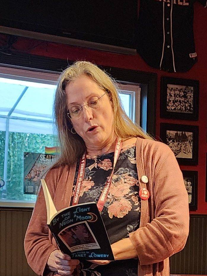 Madville Publishing founder Kim Davis reads at the Offsite Reading at The Chieftain Irish Pub: Madville Publishing, Iris Press, and Stephen F. Austin State University Press. Photo by Lee Zacharias.