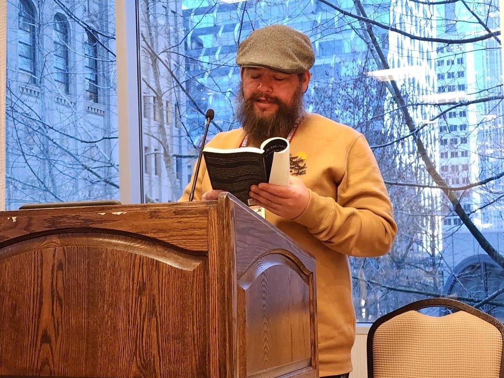 Author Mike Hilbig reads during the Madvillains Read event. Photo by Lee Zacharias.