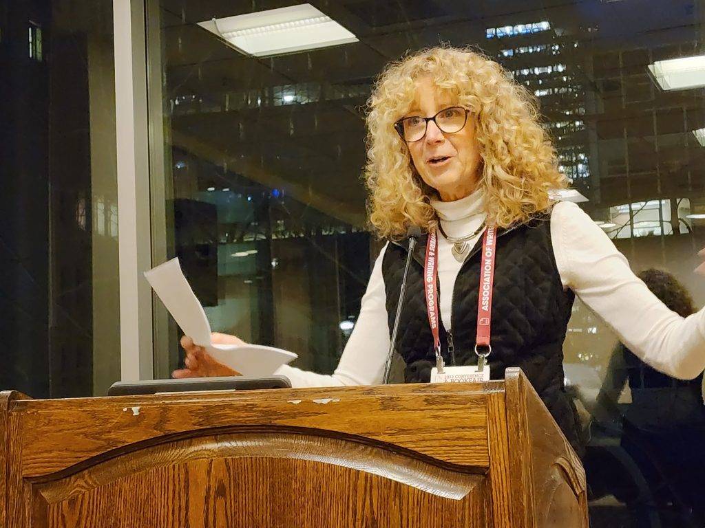 Lisa Lanser Rose reads at the Madvillans Read event. Photo by Lee Zacharias.
