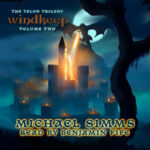 Audiobook cover for Windkeep: Volume Two in the Talon Trilogy by Michael Simms. The cover is in dark blue to black shades with bright dots of flame at the tops of turret towers circling a central tower where a dragon can be seen breathing fire on the central towers. You can see the tragon in sihlouette because there's a full moon behind her.