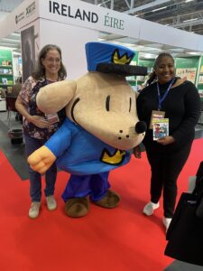 Kim Davis, Dogman, and Deborah Franklin in front of our booth at the Frankfurter Buchmesse