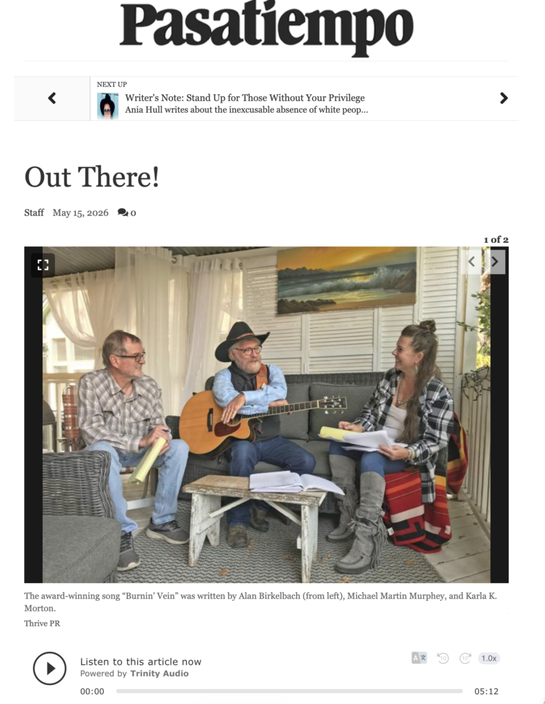 Screen capture from Pasatiempo magazine of an article entitled "Out There!" featuring a review of Santa Fe Trail: Chasing the Big West by poet authors, karla k. morton and Alan Birkelbach, and musician Michael Martin Murphey. In the photo they sit together. Michael holds a guitar and wears a black hat, while Alan and karla hold notepads.