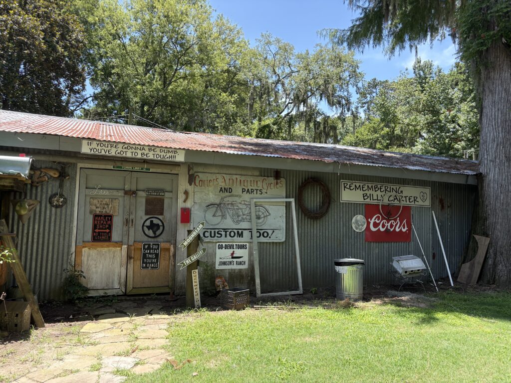 An old building with a lot of signs on it.