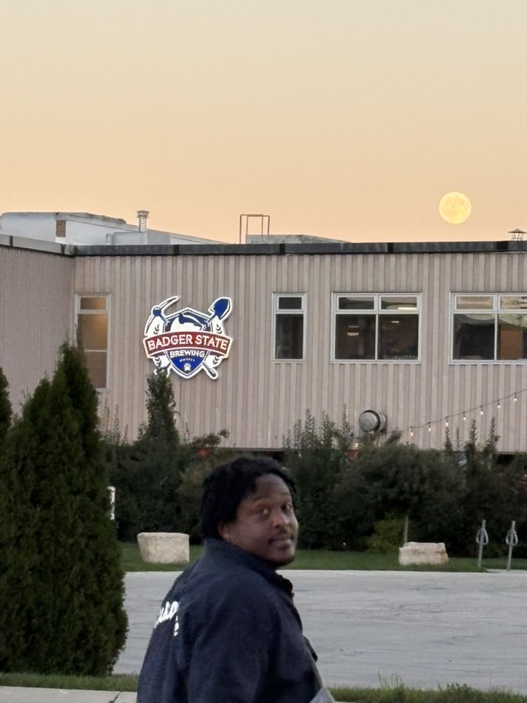 Danez Smith walking to the Badger State Brewery prior to his keynote talk and reading.