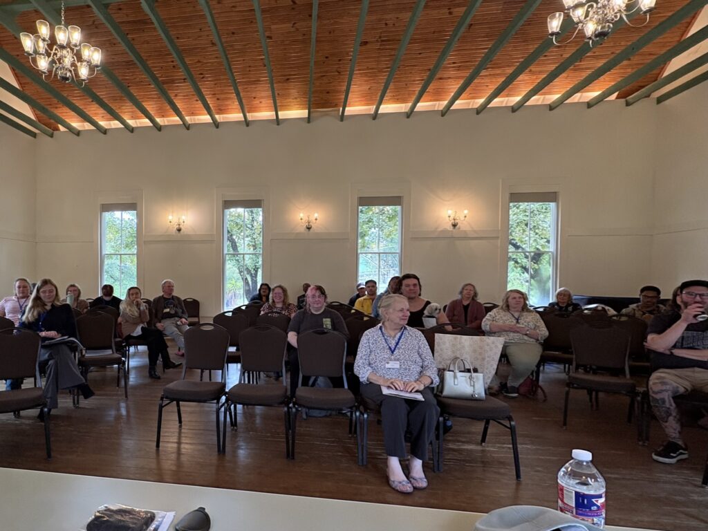 Looking out from the speakers' table at the packed room at TACW 2026.